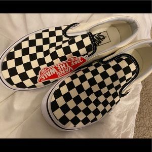Black and White checkered slip on vans